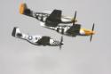 North American Aviation P-51 Mustang three-ship formation at Duxford Flying Legends 2009