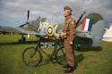 Dads Armys Clive Dunn look-alike standing by Peter Teichams Hurribomber at Shoreham Air Show 2009