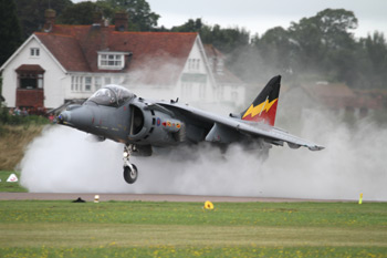Harrier Jump Jet surrounded by spray at Shoreham Air Show 2010