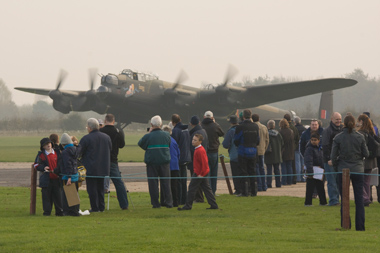 Avro Lancaster Mk VII NX611 Just Jane and crowd at the East Kirkby Armistice day event