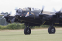 Avro Lancaster Mk VII NX611 Just Jane taxiing around the grass strip at the East Kirkby RAFBF Air Show 2010