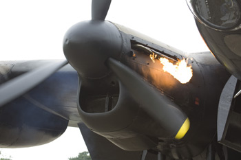 Avro Lancaster Just Jane engine starting up with flames coming out of it at the East Kirkby RAFBF Air Show 2010