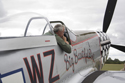 Rob Davies sitting in P-51D Mustang Big Beautiful Doll at the East Kirkby RAFBF Air Show 2010
