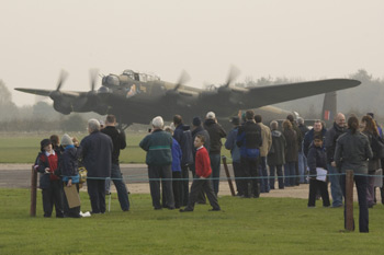 Avro Lancaster Mk VII NX611 Just Jane and crowd at the East Kirkby Just Jane Armistice Event